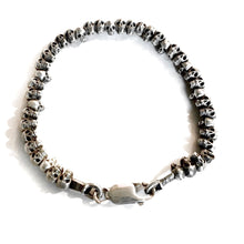 Load image into Gallery viewer, AVATA/TINY SKULLS BRACELET
